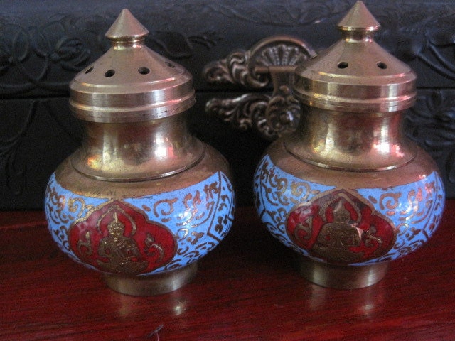 Charming brass and enamel salt and pepper shakers