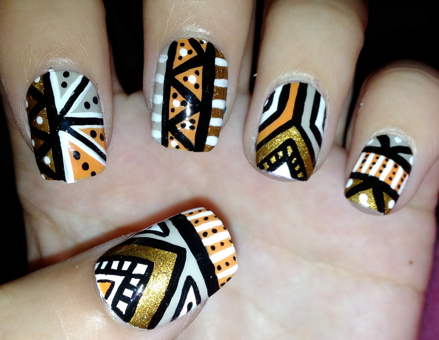 Orange and gold aztec/tribal fake nails