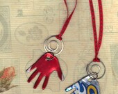 one NECKLACE Give me a hand from recycled can