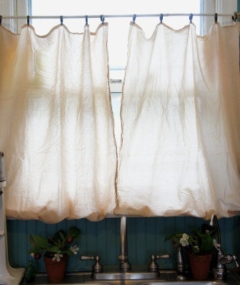2 Tea dyed flour sack curtain panels with pomms