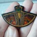 Two small Aztec Ruin like charms - Fabric - Leather - Black backing - History - Neat - cool - Supplies -