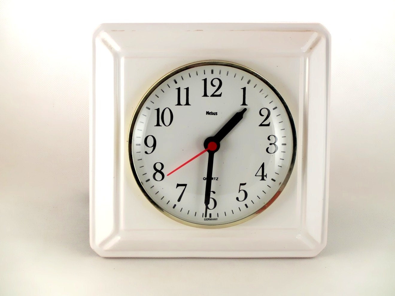 Vintage white ceramic wall hanging clock from Germany