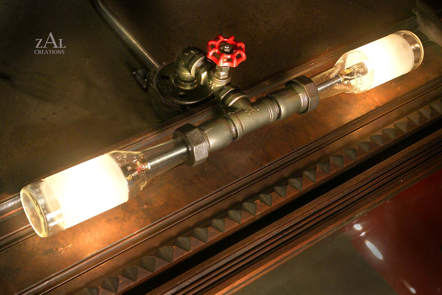 Vanity Lamp. Picture light. Beer bottles, Plumbing pipe & fittings. Vanity light. Wall lamp. Bathroom Vanity Lighting Fixture