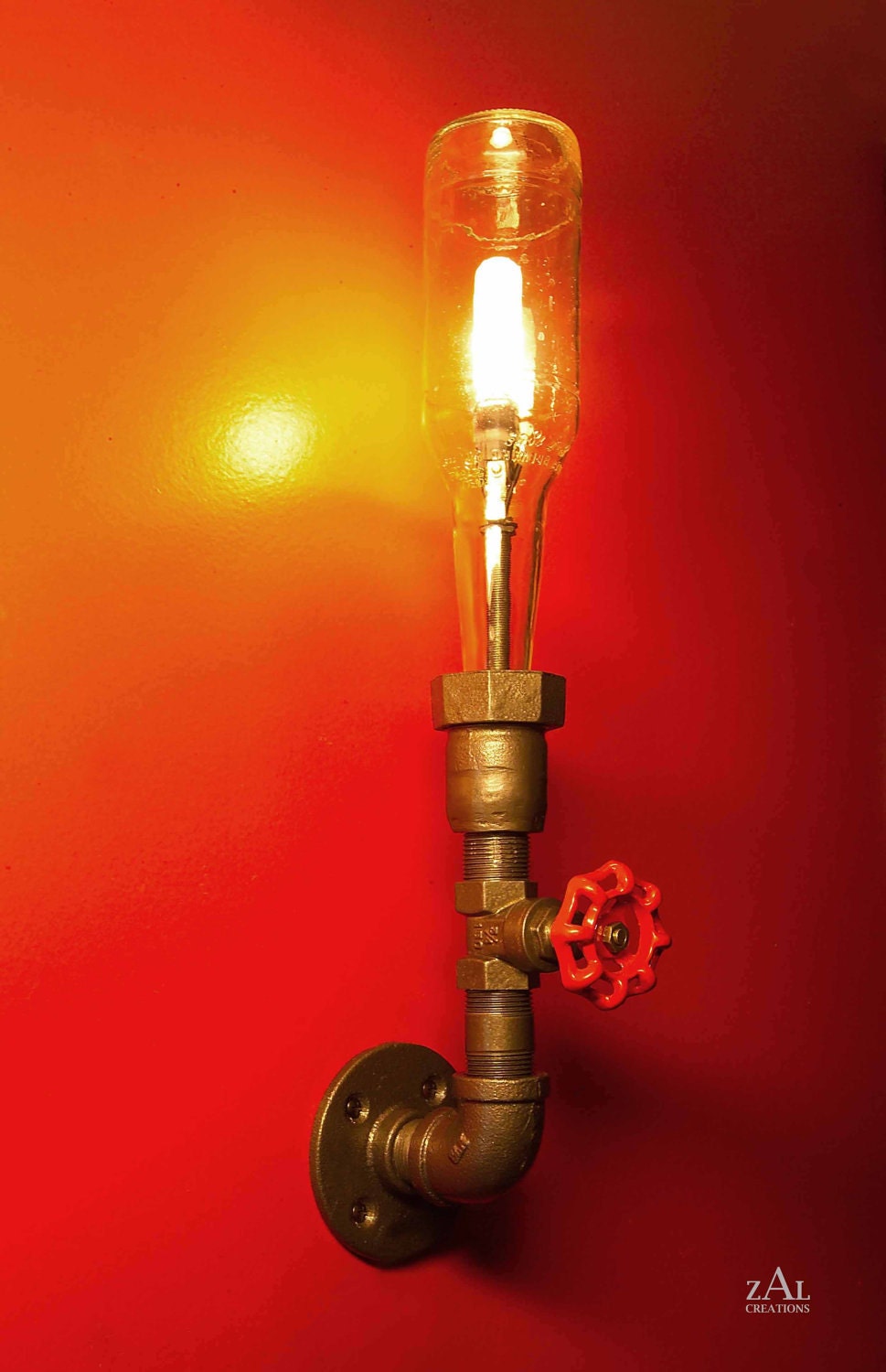 Wall lamp. Beer bottle, Plumbing pipe & fittings. Wall light .  Lighting Fixture. Sconce