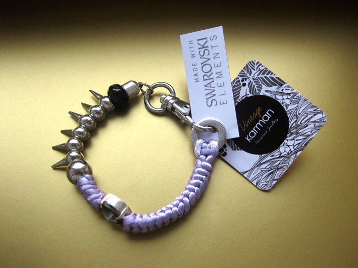 Glam Rock purple bracelet. Purple silk knotted bracelet with Swarovski crystal. Elegant braided charm bracelet by Karman Jewelry.