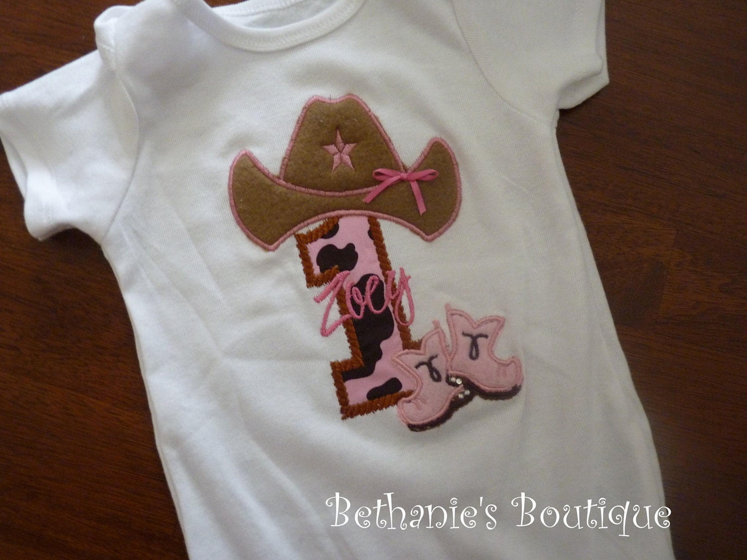 Cowgirl- Cowboy tee or onesie. Cowboy hat and boots.