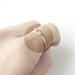 Delicate stacking rings. Leaf and berry. Sterling silver and gold brass