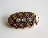 Golden metal vintage brooch, rhinestone pin, retro jewelry