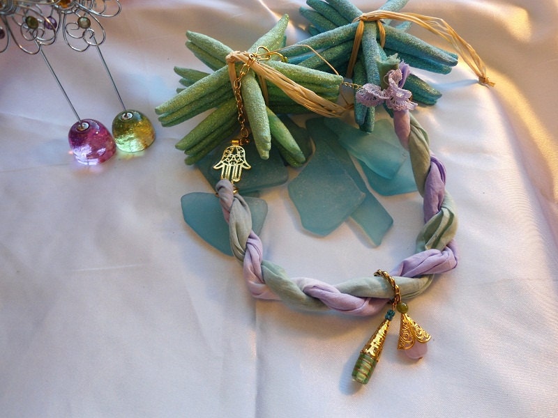 SALE--Glass beaded with gold plated hamsa and lilac flowers fabric Necklace