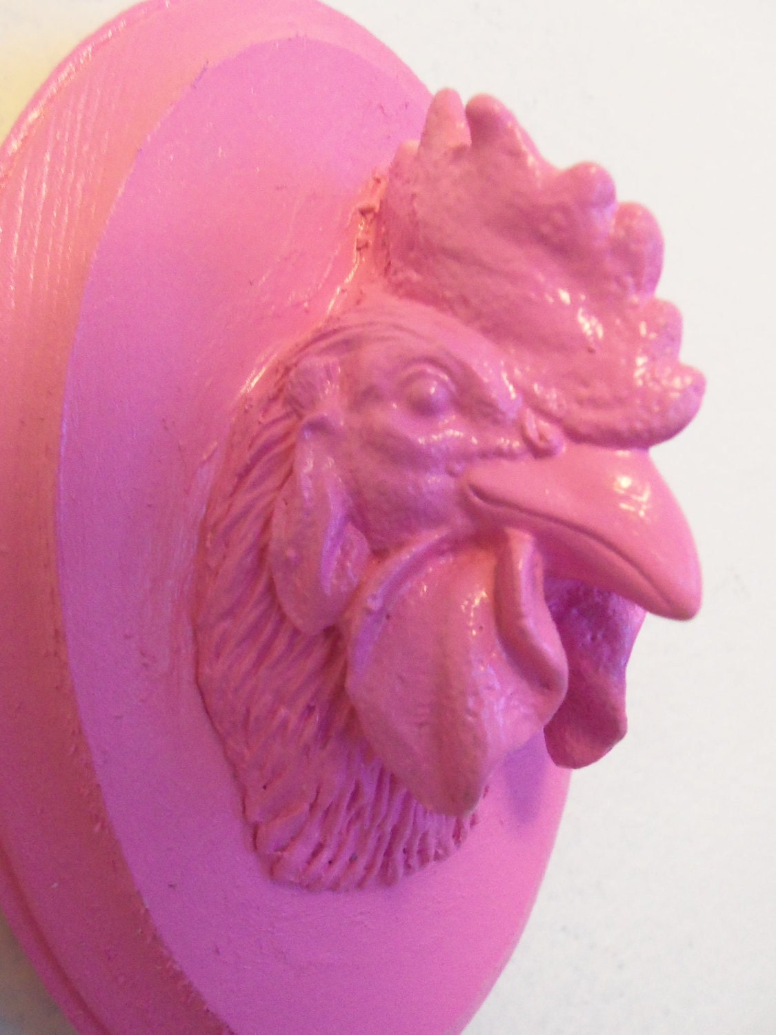 pink faux taxidermy rooster head wall hanging