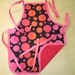 Toddler Apron (warm colors) for Eating, Baking or Painting (Reds and Pinks)