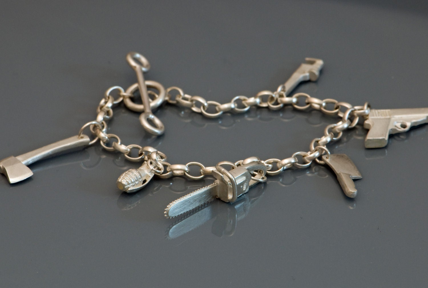 Charm Bracelet - Solid Silver - Free Shipping - Gun, Chainsaw, Monkey Wrench, Grenade, Cleaver, Hatchet Charms - Sterling Silver Bracelet