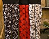 satin trousers with wide elastic waist band. skull print