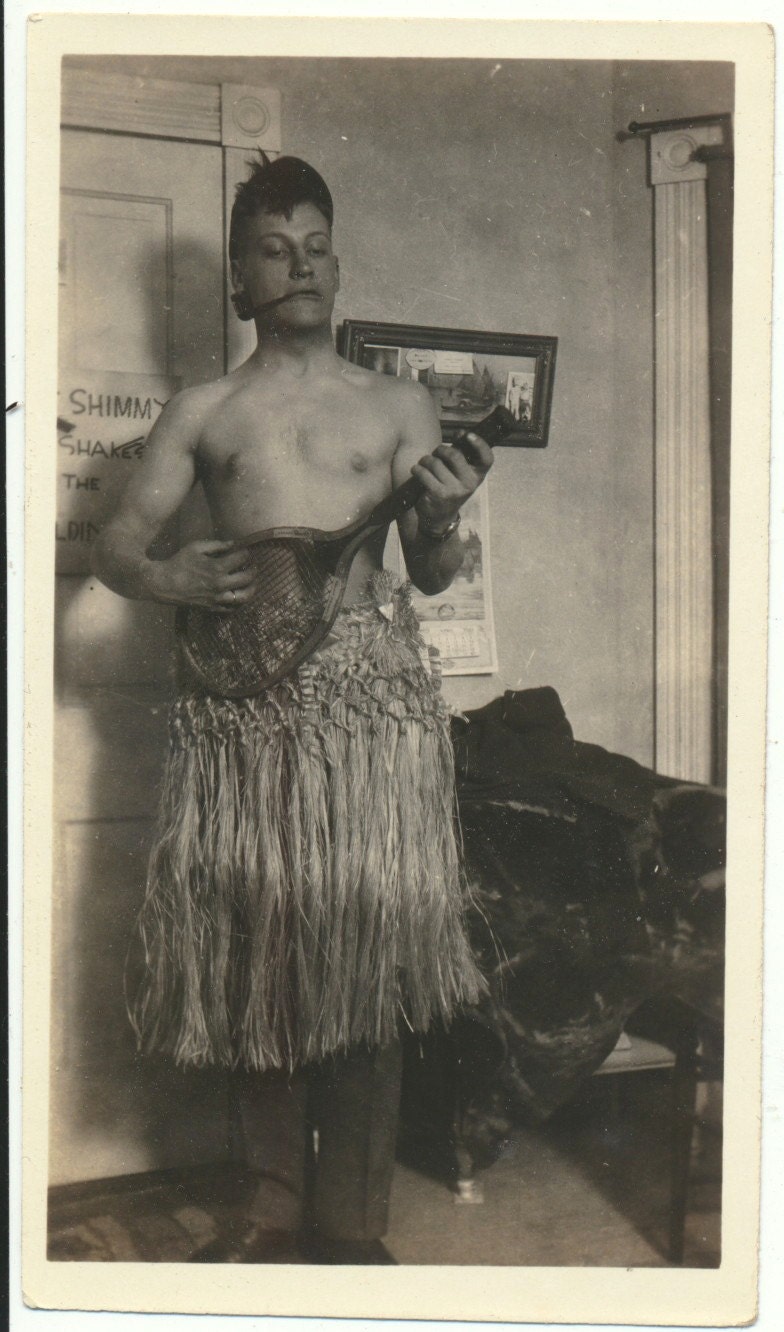 Hula BOY Grass Skirt playing Tennis Racket Ukulele smoking Pipe