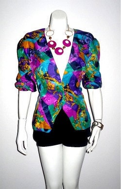 Multi color long sleeve blazer with low neckline S to M