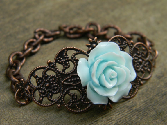 How does your Garden Grow Powder Blue Rose Antiqued Brass Bracelet
