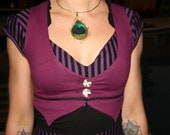 Plum Lotus vest with Lotus petals, and Gold Lotus Screenprint on the back