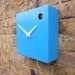 Modern orange cuckoo clock with moving bird & pendulum RESERVED