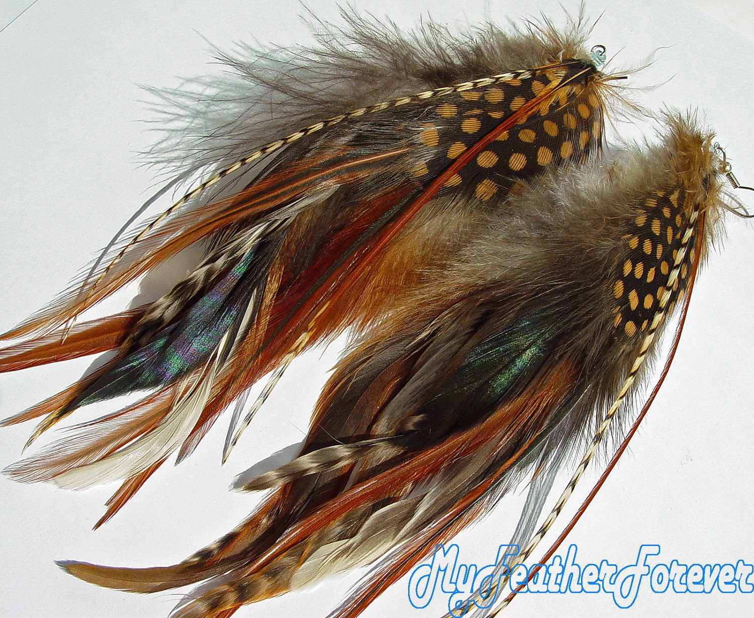 Brown, blond, green iridecent and black grizzly dotted long feather earrings