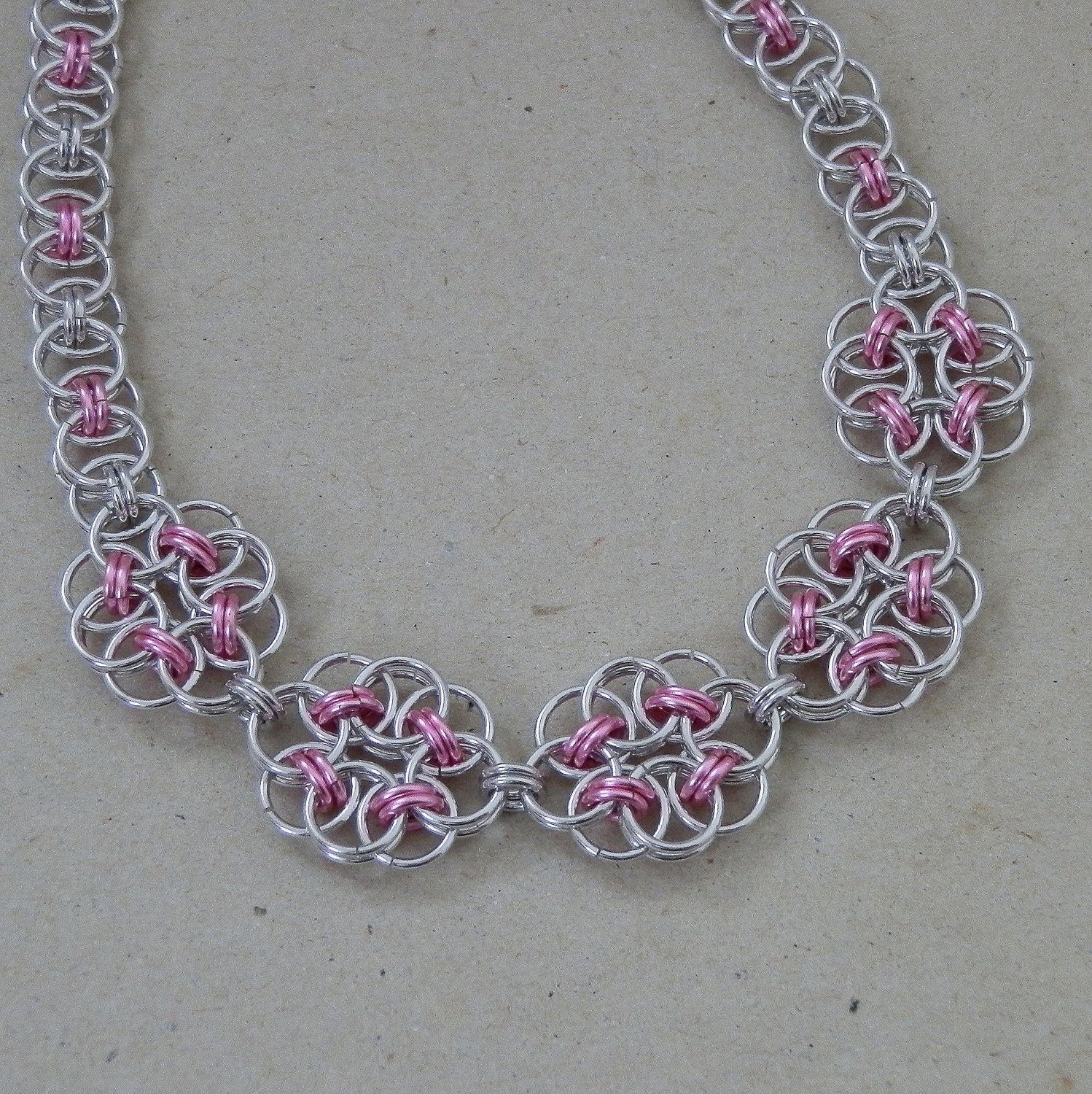 Chainmaille Necklace, Celtic Style Helm Weave, Flowers in Pink and Silver Jump Rings, Handmade by Lace Metal on Etsy