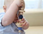 Blue teething rattle for baby boy. Natural wooden toy with organic cotton. Ready to ship.