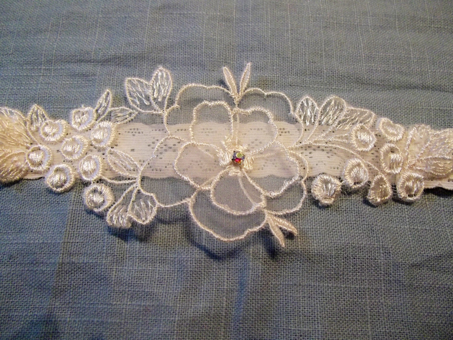 Delicate ivory floral lace garter