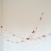 Peach and antique pink paper butterflies garland - wall decor