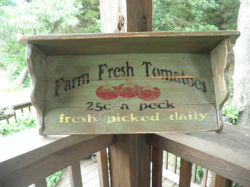 shelf, with sign " farm fresh tomatoes" old rustic sign, wood, green with distressed lettering