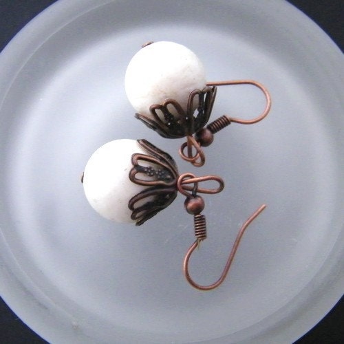 beautiful simple earrings with white coral, and copper, metalwork