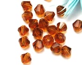 4mm Cut Glass Beads 5301 Baby Bicones Dark Amber 20 Pack