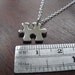 Two Miniature Puzzle Piece Pendants on one Necklace
