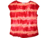 Shibori tie-dyed silk blouse in peach and red