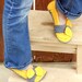 Bow tie strap slippers, booties, shoes, socks in thunderous sunshine yellow and grey.