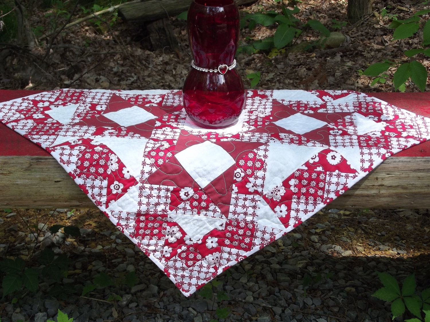On Sale for the Holidays Quilted Table Topper in Reds and Whites