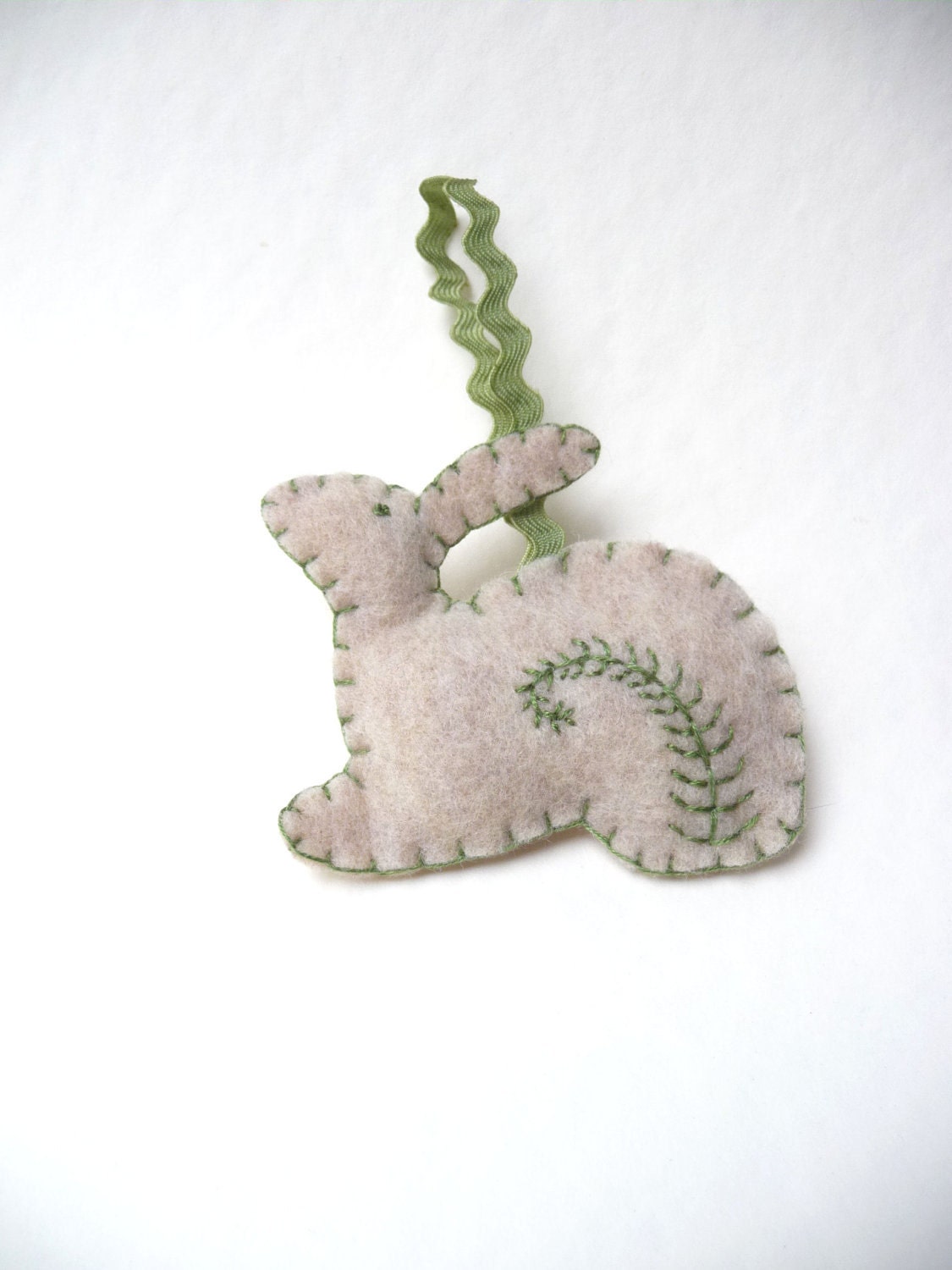 Fern accented rabbit ornament