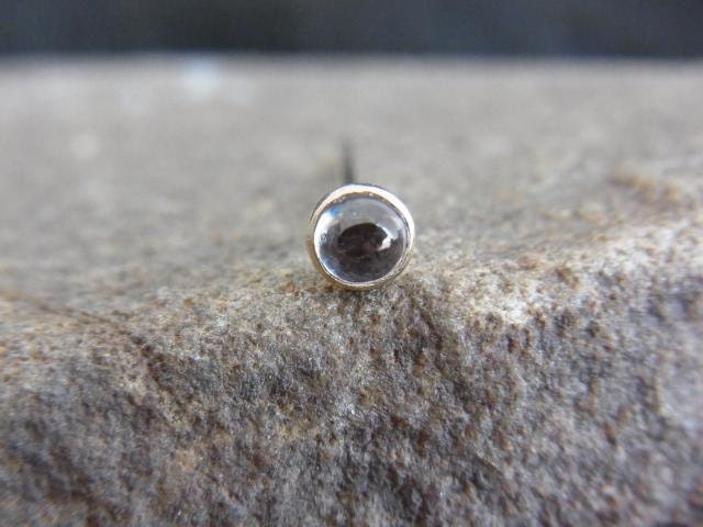 14k solid gold with Genuine Blue topaz bezel set nose screw