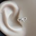 16 gague Cutie bow Silver bio flexible Tragus