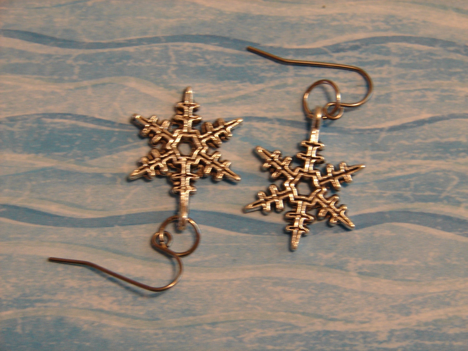 Pierced Earrings Silver Metal Filigree Snowflakes