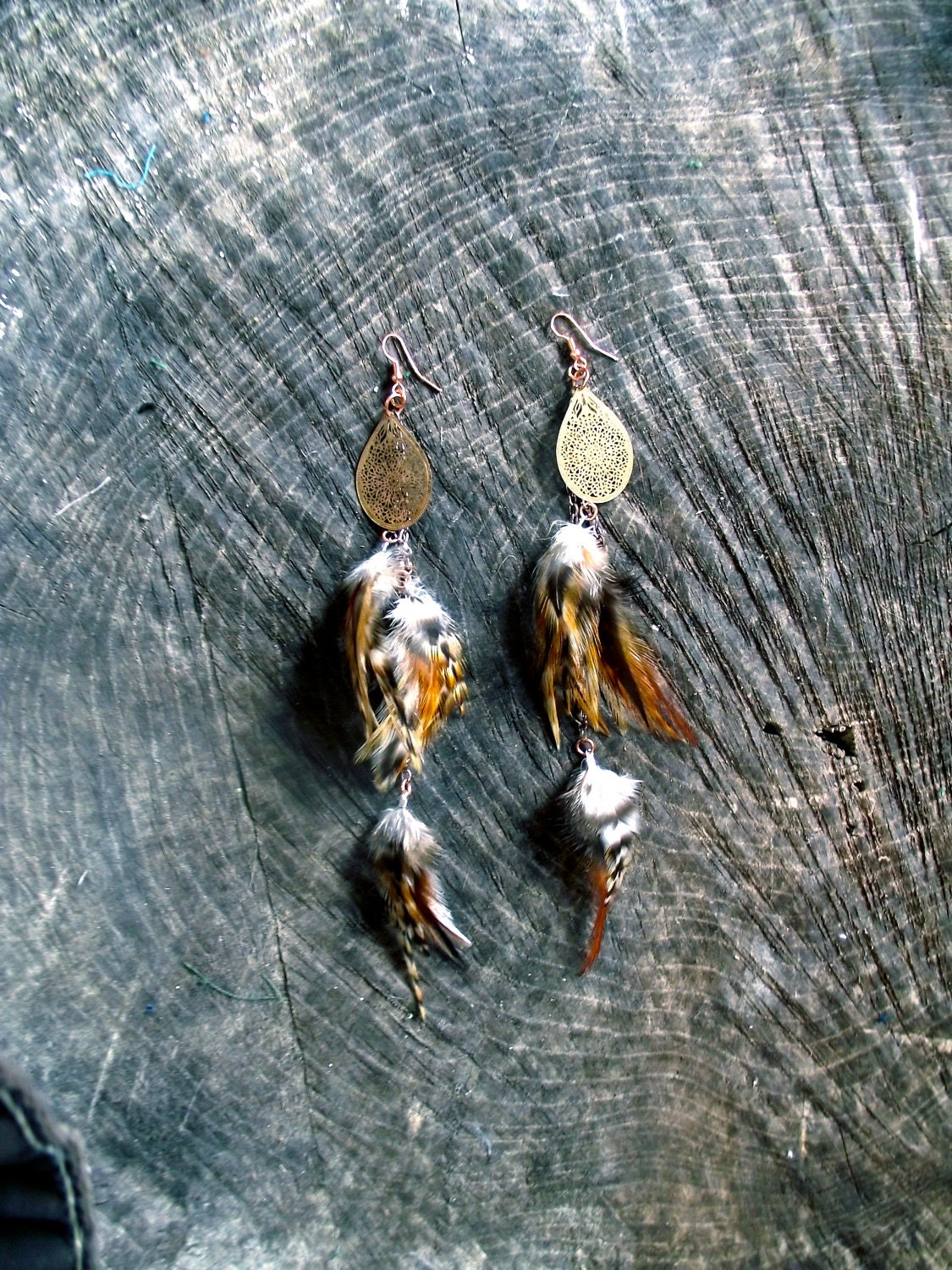 All of these dreams : bohemian detailed brass feather earrings