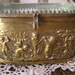Antique Trinket Box - Cherubs in the garden around the edge and a beveled glass lid