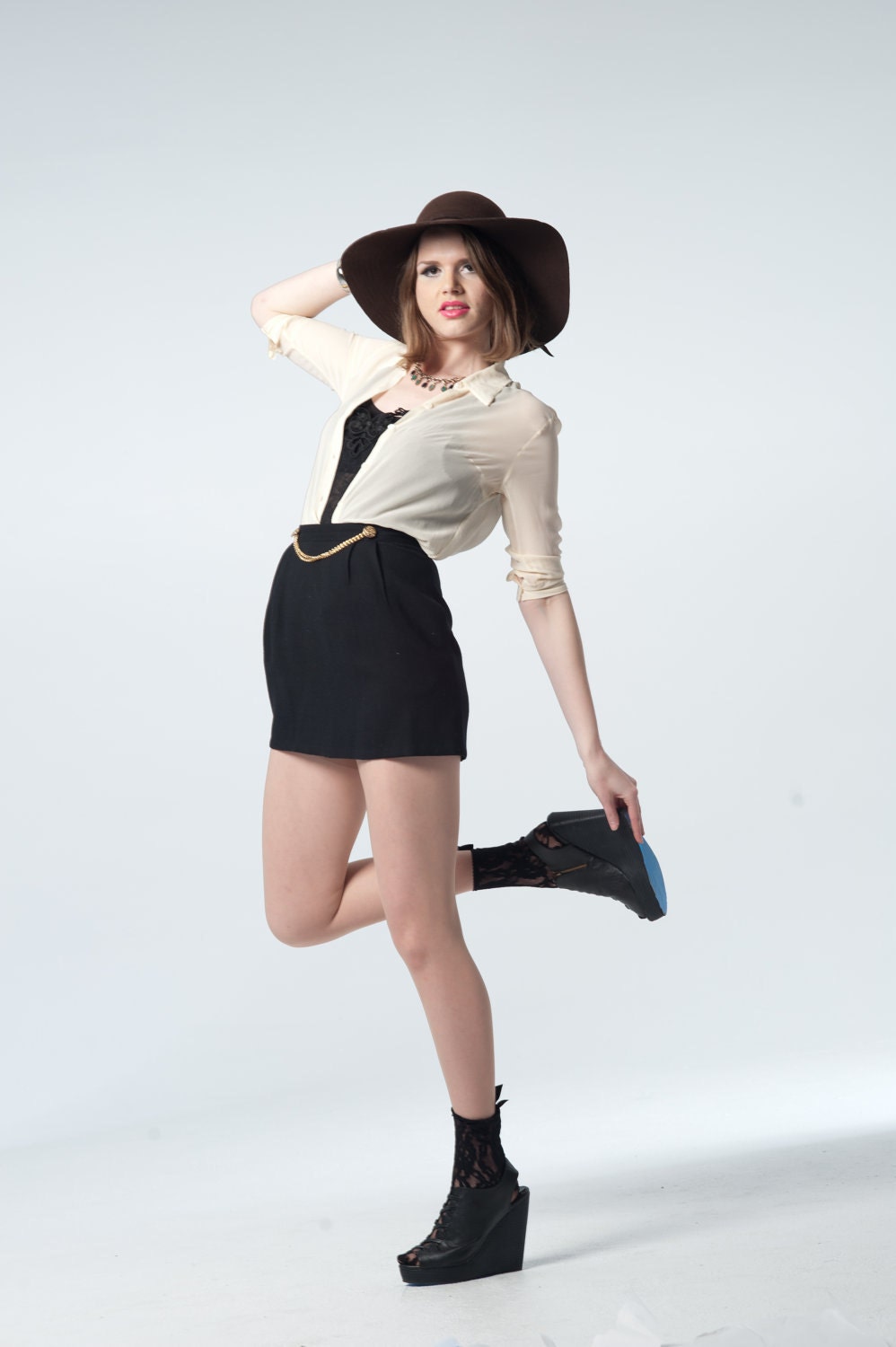 Sassy Secretary- Black high waist mini with button and chain detail