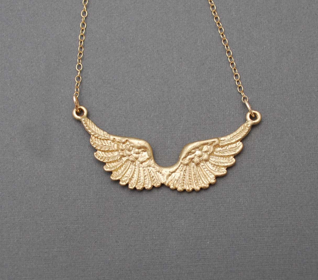 Angel Wing Necklace comes in gold and silver