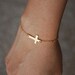 Gold Sideways Cross Bracelet Horizontal