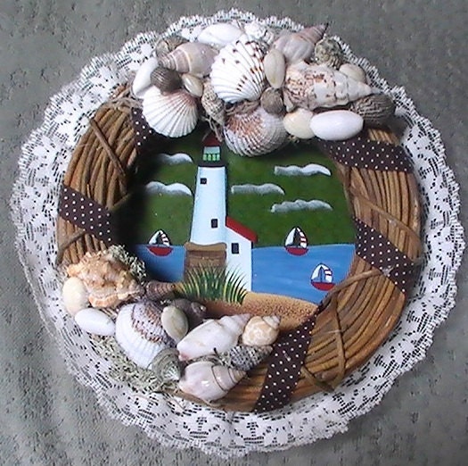 Nautical wreath with litehouse and shell decor