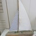 driftwood sailing boat