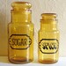 Set of Clear Amber Glass Jars Marked Sugar and Spice with Lids Black Print