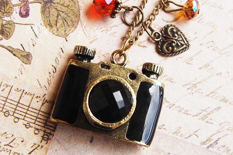 Treasured photos - a locket camera necklace