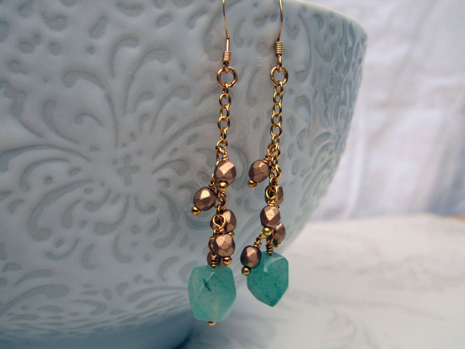 Boho earrings from light green aventurine on gold plated chain with dangly gold beads