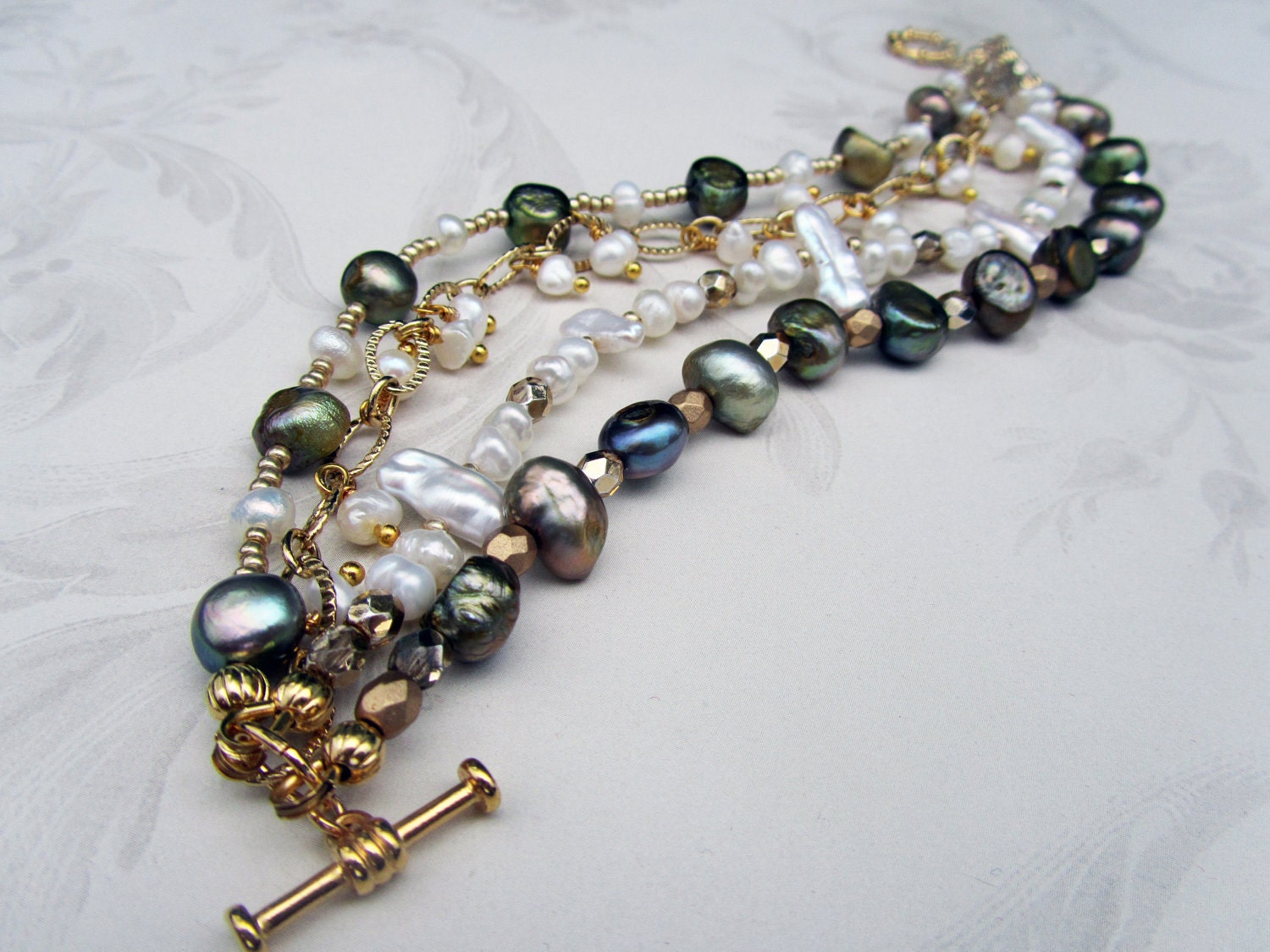Beachy boho freshwater pearl and gold beaded multi strand bracelet