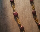 Purple and gold hand beaded necklace